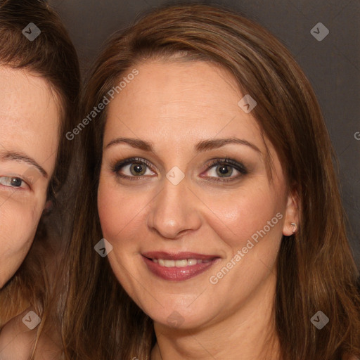 Joyful white adult female with long  brown hair and brown eyes