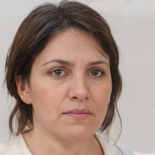 Neutral white adult female with medium  brown hair and brown eyes