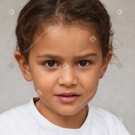 Joyful white child female with short  brown hair and brown eyes