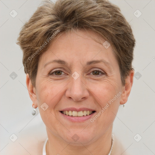 Joyful white adult female with short  brown hair and brown eyes