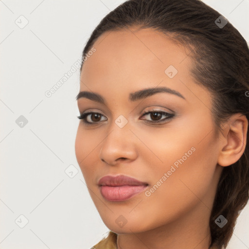 Joyful latino young-adult female with long  brown hair and brown eyes