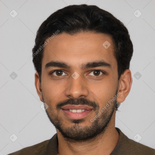 Joyful latino young-adult male with short  black hair and brown eyes