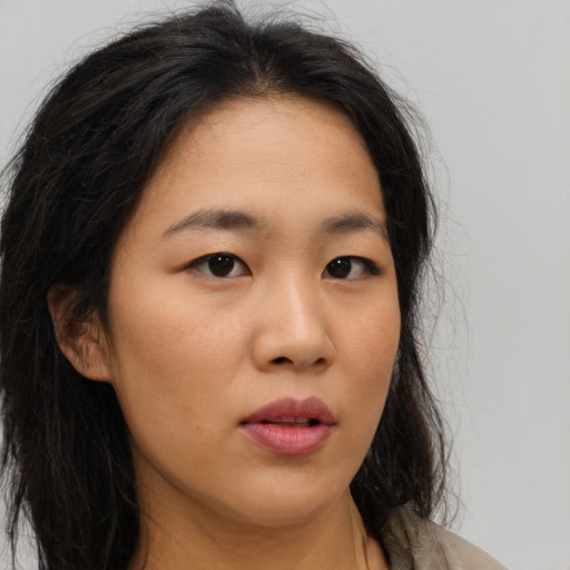 Neutral asian young-adult female with long  brown hair and brown eyes