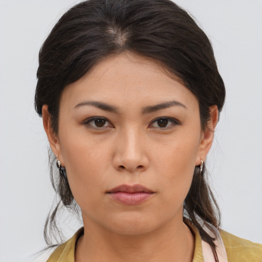 Neutral asian young-adult female with medium  brown hair and brown eyes