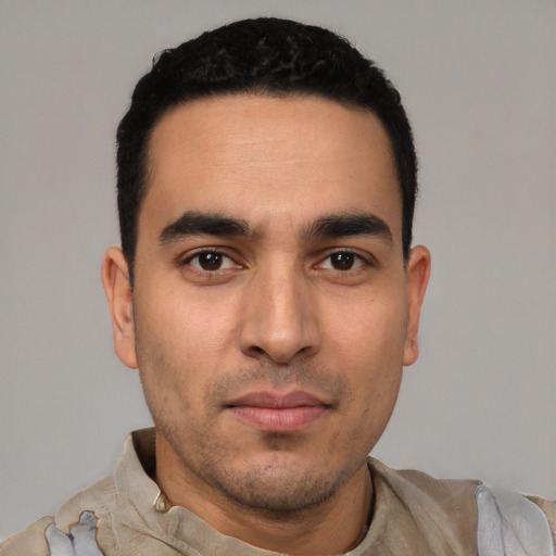 Neutral white young-adult male with short  black hair and brown eyes