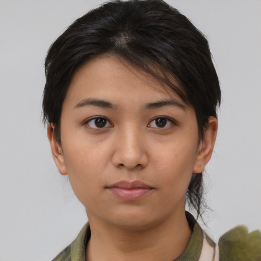 Neutral latino young-adult female with medium  brown hair and brown eyes