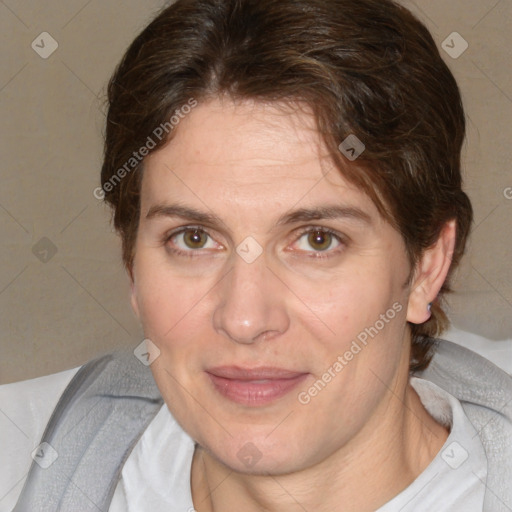 Joyful white adult female with short  brown hair and brown eyes