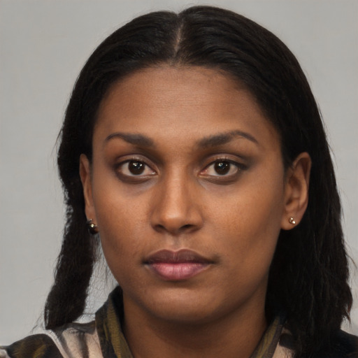Neutral latino young-adult female with long  black hair and brown eyes