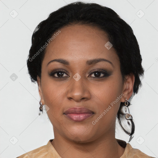 Joyful black young-adult female with short  black hair and brown eyes