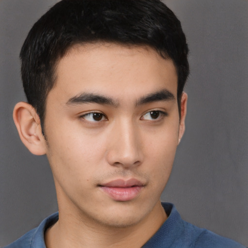 Neutral asian young-adult male with short  brown hair and brown eyes