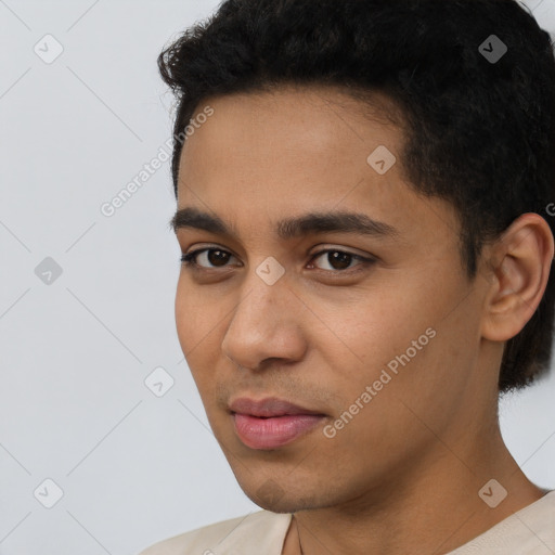 Neutral latino young-adult male with short  black hair and brown eyes