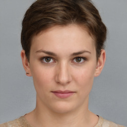 Neutral white young-adult female with short  brown hair and brown eyes