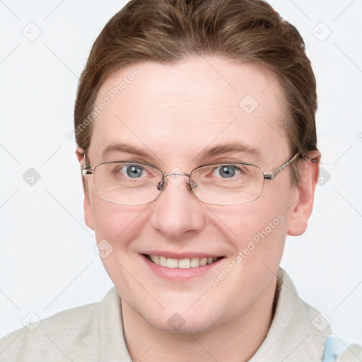 Joyful white adult female with short  brown hair and blue eyes