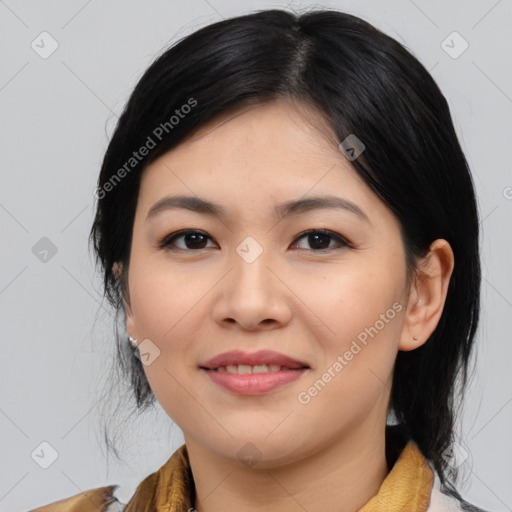 Joyful asian young-adult female with medium  black hair and brown eyes