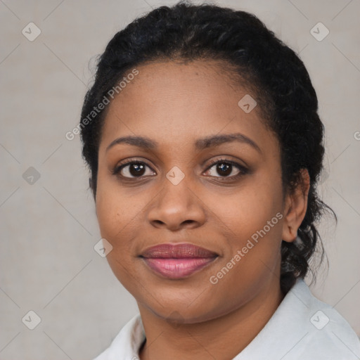 Joyful black young-adult female with medium  black hair and brown eyes