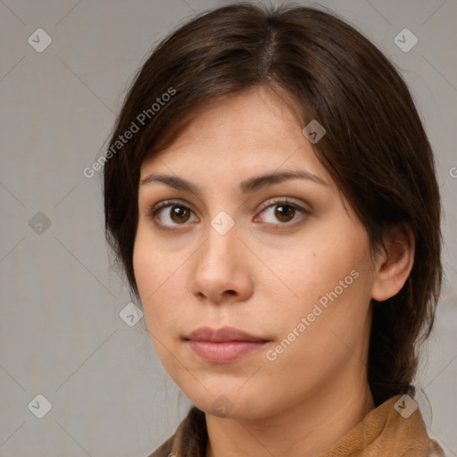 Neutral white young-adult female with medium  brown hair and brown eyes