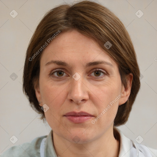 Joyful white adult female with medium  brown hair and grey eyes