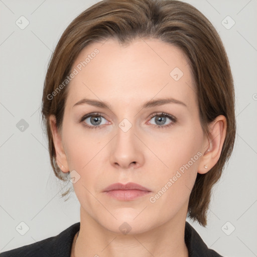 Neutral white young-adult female with medium  brown hair and grey eyes