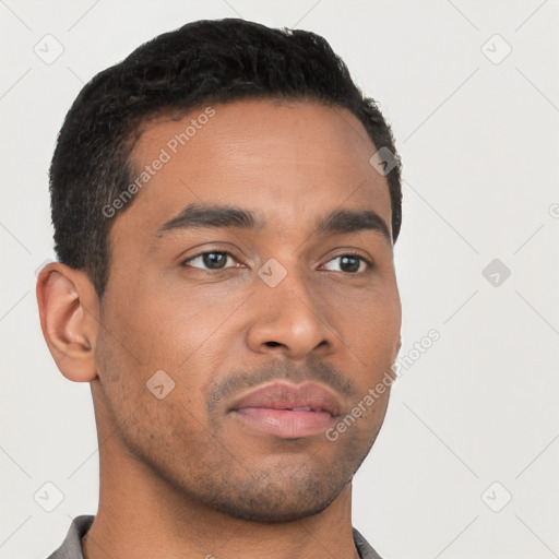 Neutral latino young-adult male with short  brown hair and brown eyes