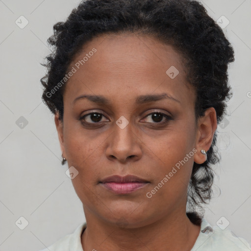 Neutral black young-adult female with short  brown hair and brown eyes