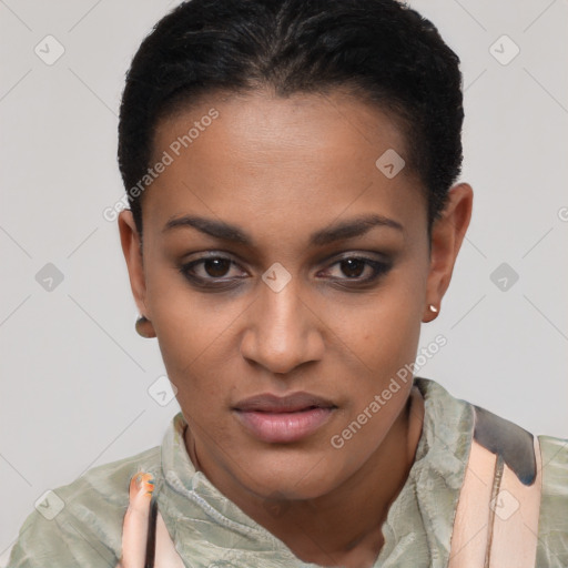 Joyful black young-adult female with short  brown hair and brown eyes