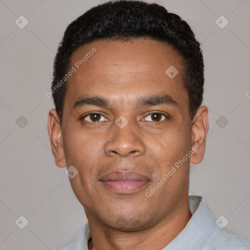 Joyful black young-adult male with short  black hair and brown eyes