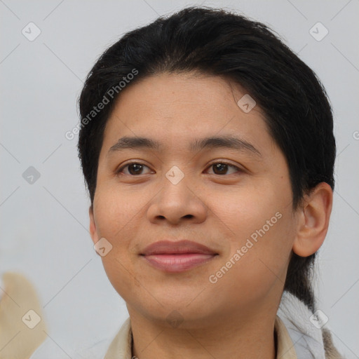 Joyful asian young-adult female with short  brown hair and brown eyes