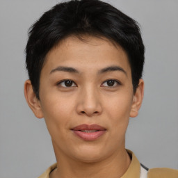 Joyful asian young-adult female with short  black hair and brown eyes