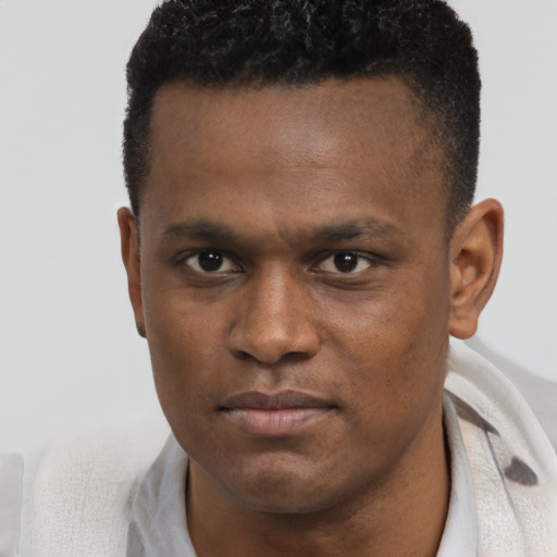 Neutral black young-adult male with short  brown hair and brown eyes