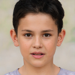 Joyful white child male with short  brown hair and brown eyes