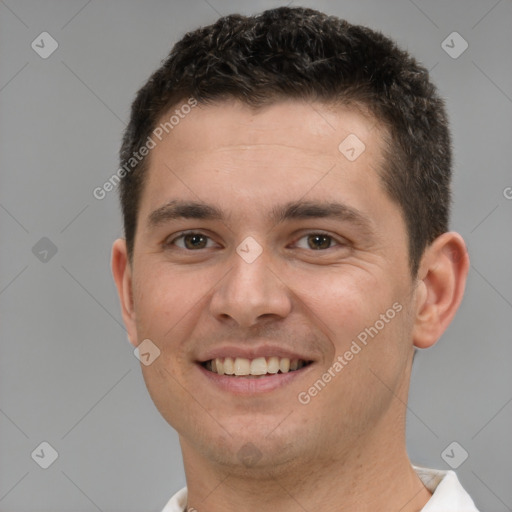 Joyful white young-adult male with short  brown hair and brown eyes