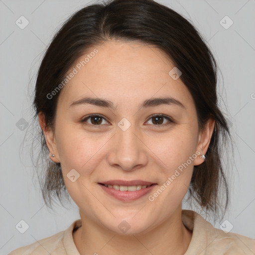 Joyful white adult female with medium  brown hair and brown eyes