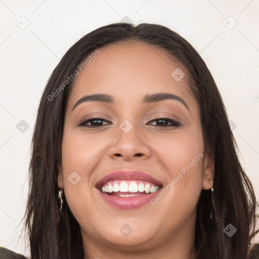 Joyful white young-adult female with long  black hair and brown eyes