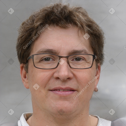 Joyful white adult male with short  brown hair and grey eyes