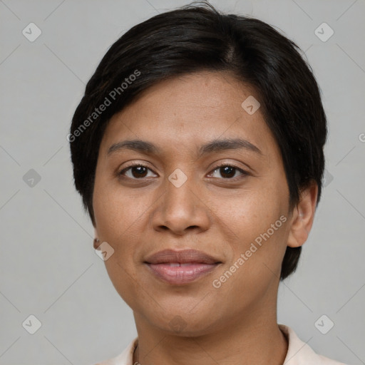 Joyful latino young-adult female with short  brown hair and brown eyes