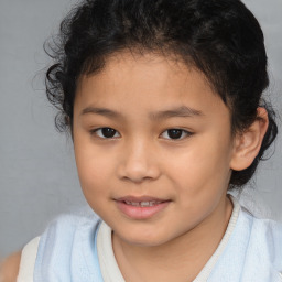 Joyful white child female with short  brown hair and brown eyes