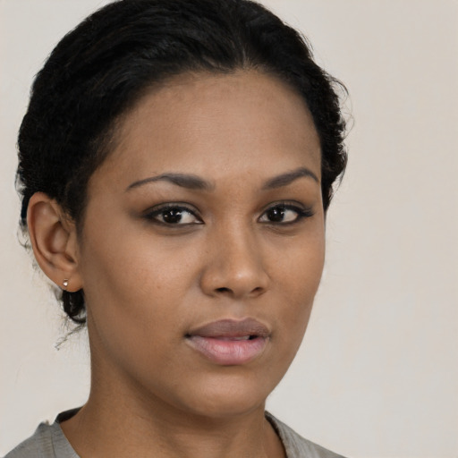 Neutral latino young-adult female with short  black hair and brown eyes