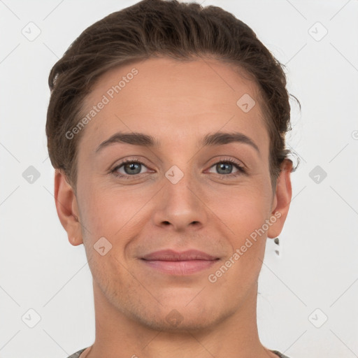 Joyful white young-adult female with short  brown hair and grey eyes