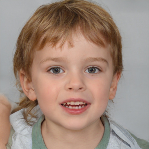 Joyful white child male with medium  brown hair and blue eyes