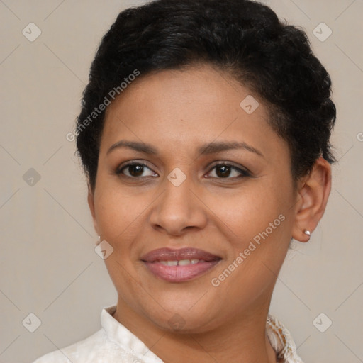 Joyful latino young-adult female with short  brown hair and brown eyes