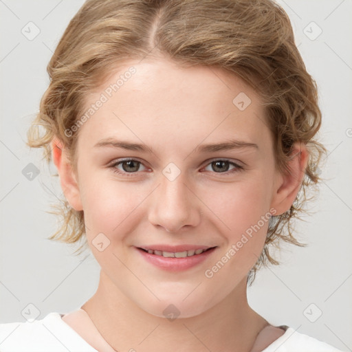 Joyful white child female with medium  brown hair and brown eyes