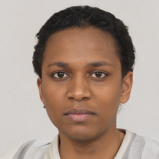 Neutral black young-adult female with short  black hair and brown eyes