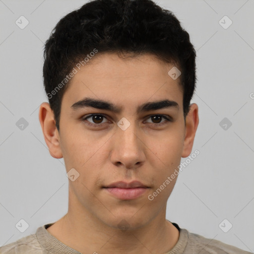 Neutral latino young-adult male with short  brown hair and brown eyes