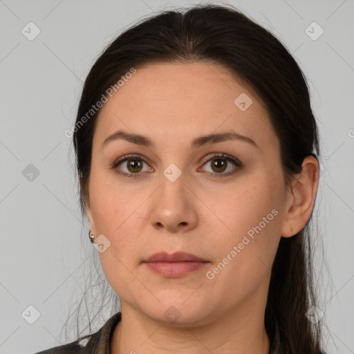 Neutral white young-adult female with long  brown hair and brown eyes