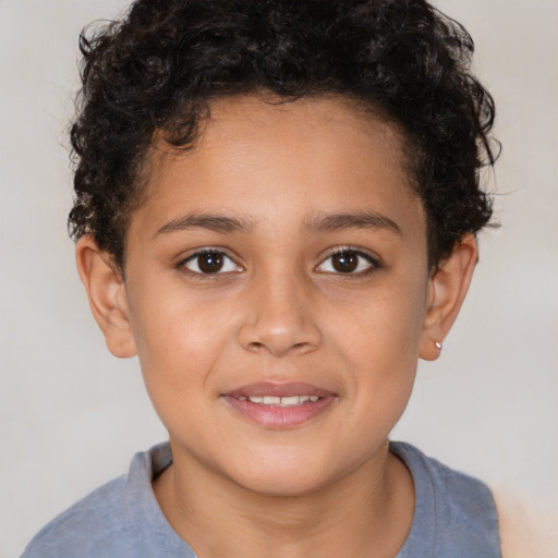 Joyful latino child female with short  brown hair and brown eyes