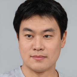 Neutral asian young-adult male with short  black hair and brown eyes