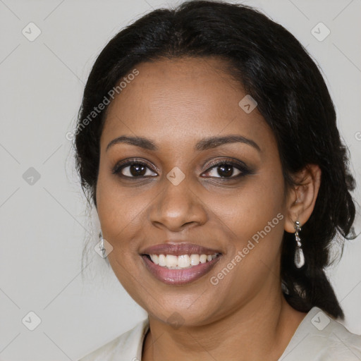 Joyful black young-adult female with medium  brown hair and brown eyes