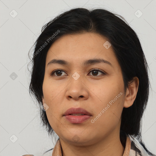 Joyful asian young-adult female with medium  black hair and brown eyes