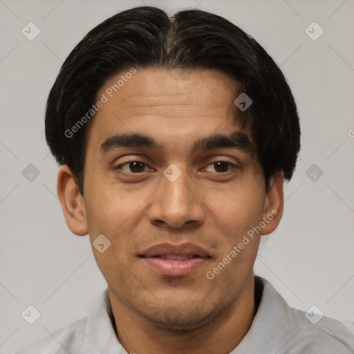 Joyful latino young-adult male with short  brown hair and brown eyes