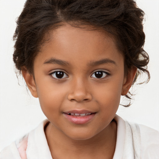 Joyful white child female with short  brown hair and brown eyes